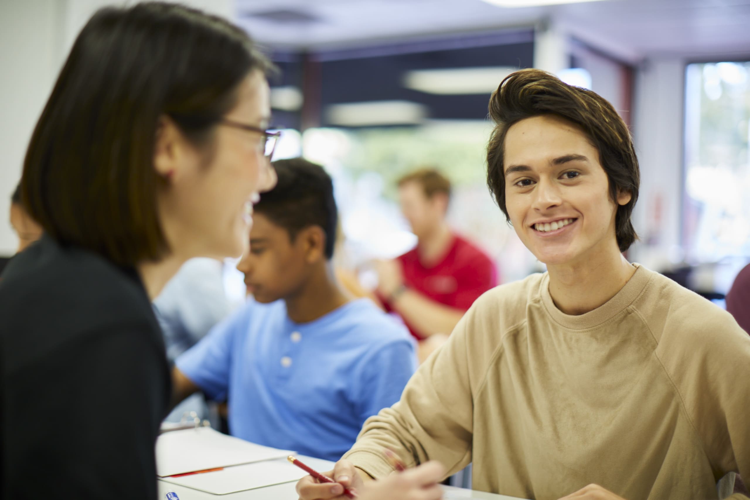 Math tutor explaining a math concept to a student