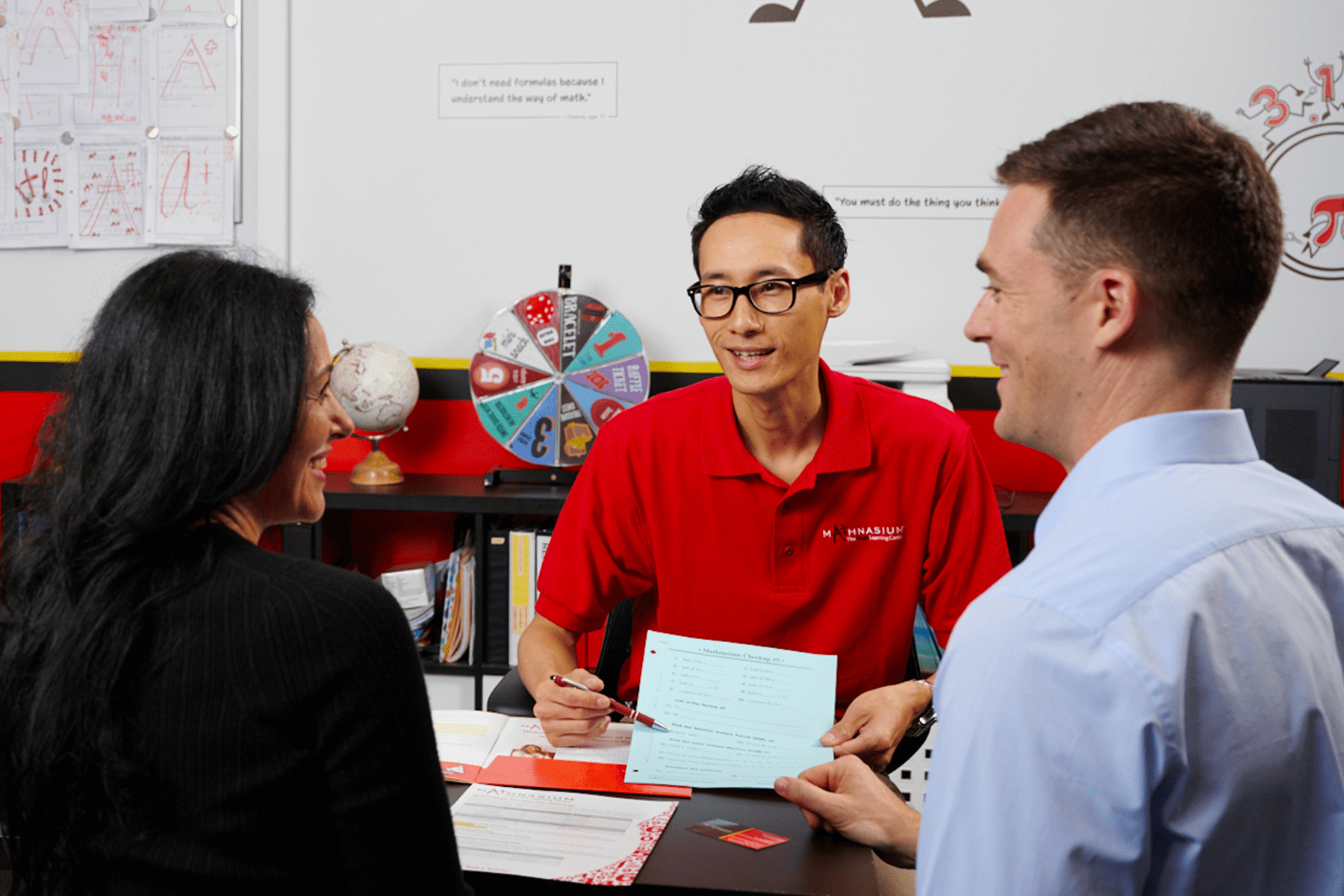 Math tutor guiding parents through customized tutoring plan