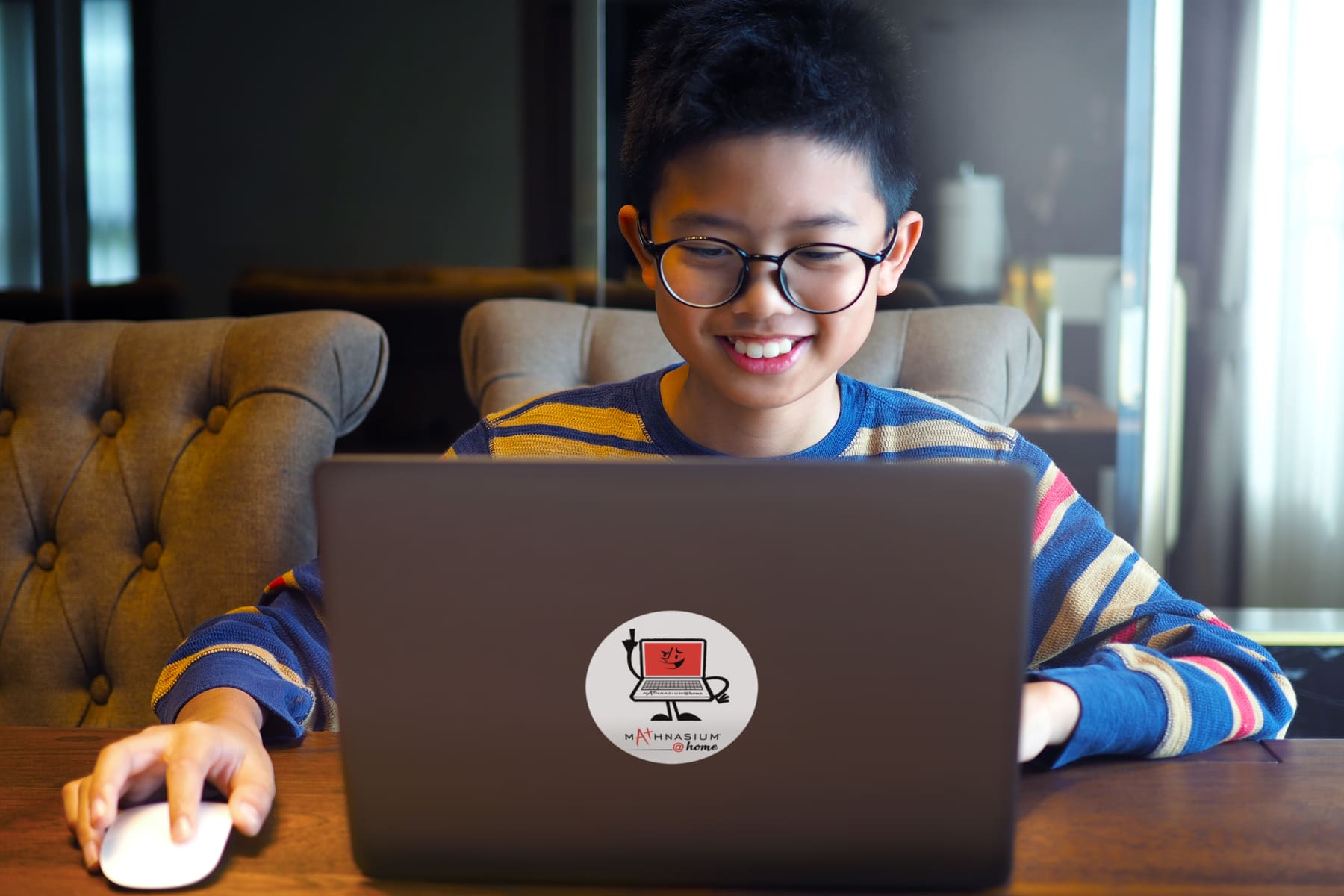 Student solving math problems during online tutoring session
