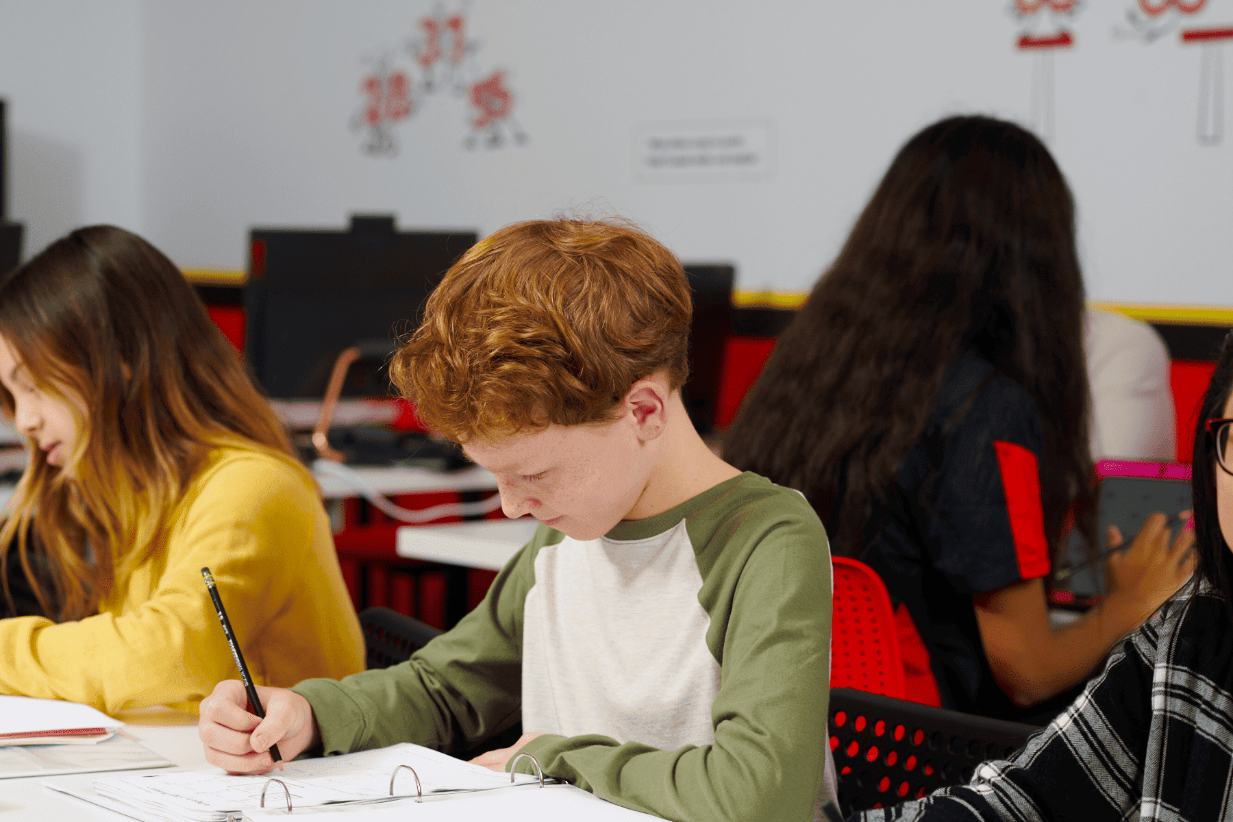 Focused student solving math problems