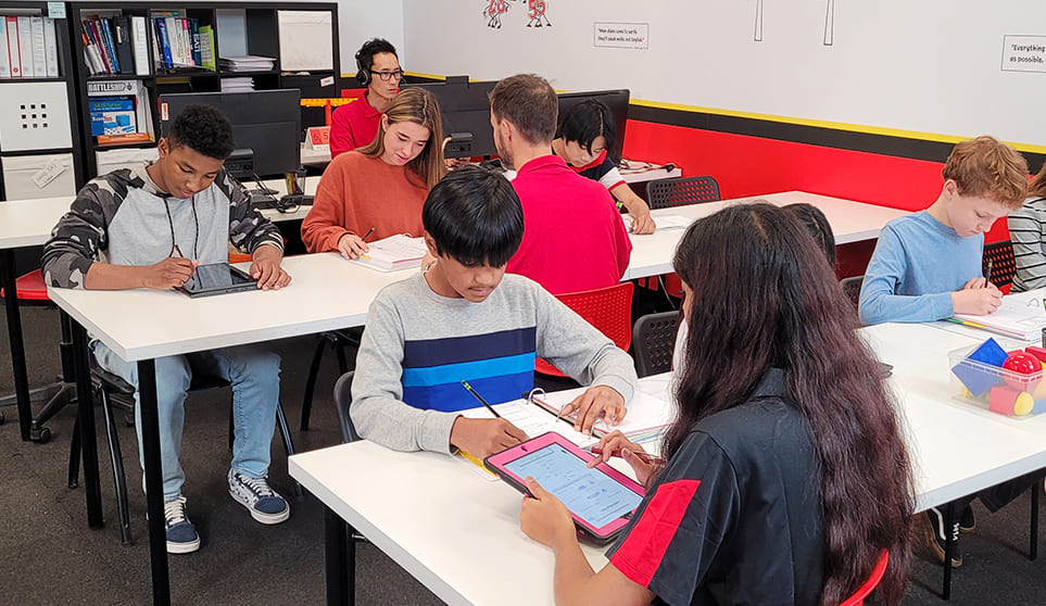 Friendly math tutor helping student understand new concepts