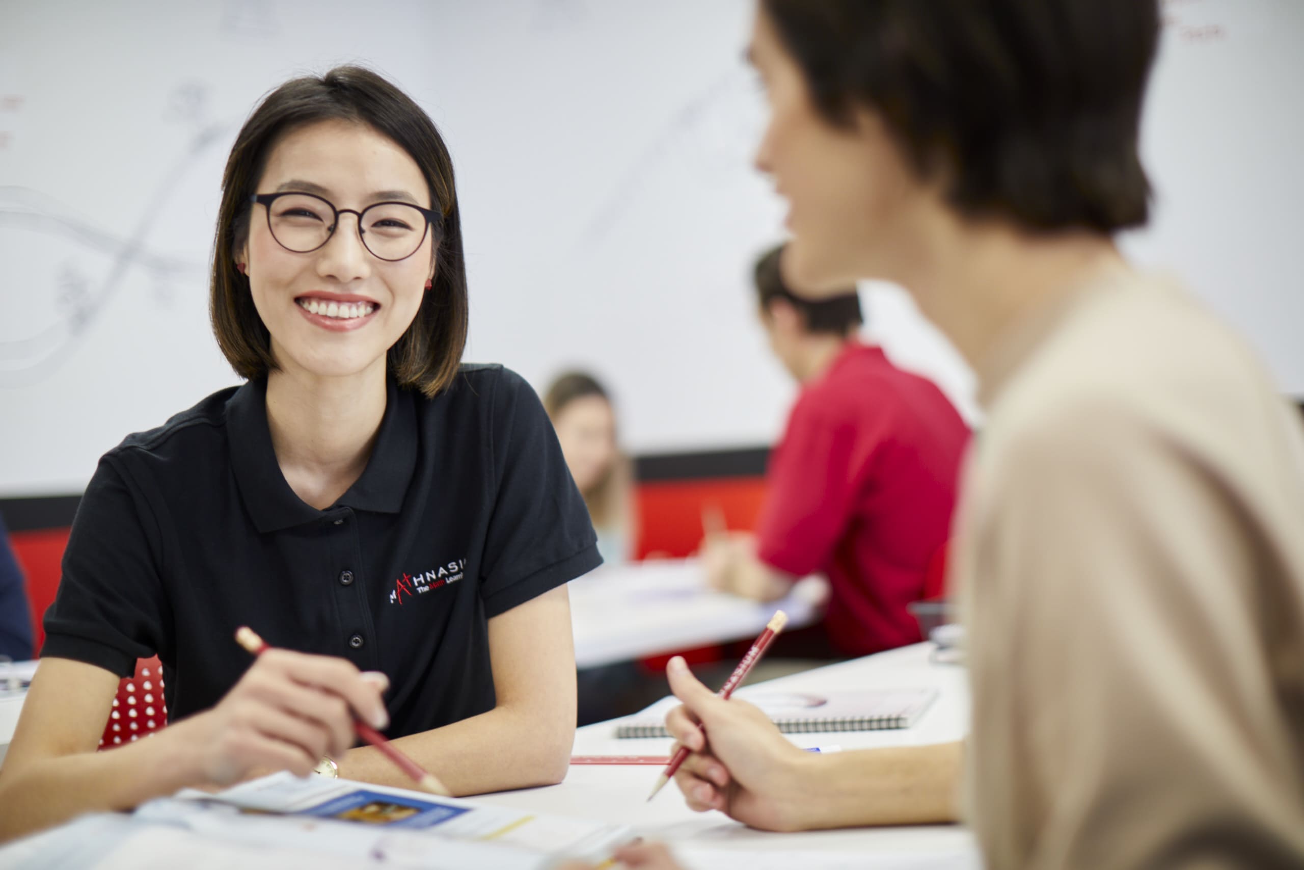 Math tutor and student during a session at Mathnasium