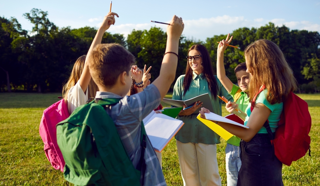 Students during a math lesson outdoors