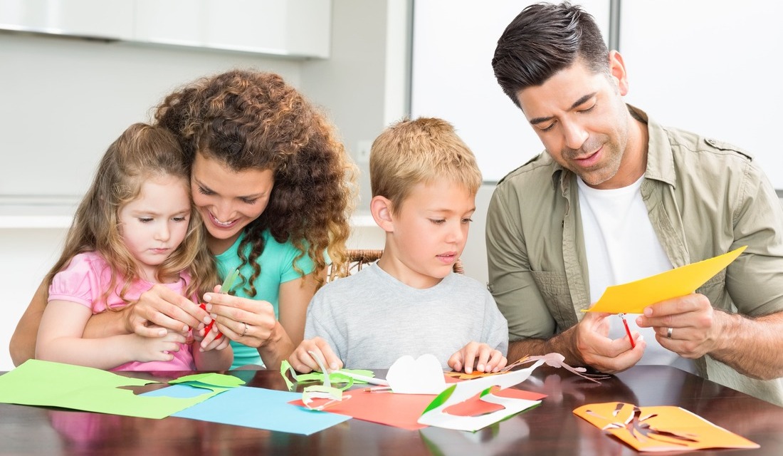 A family doing arts and crafts