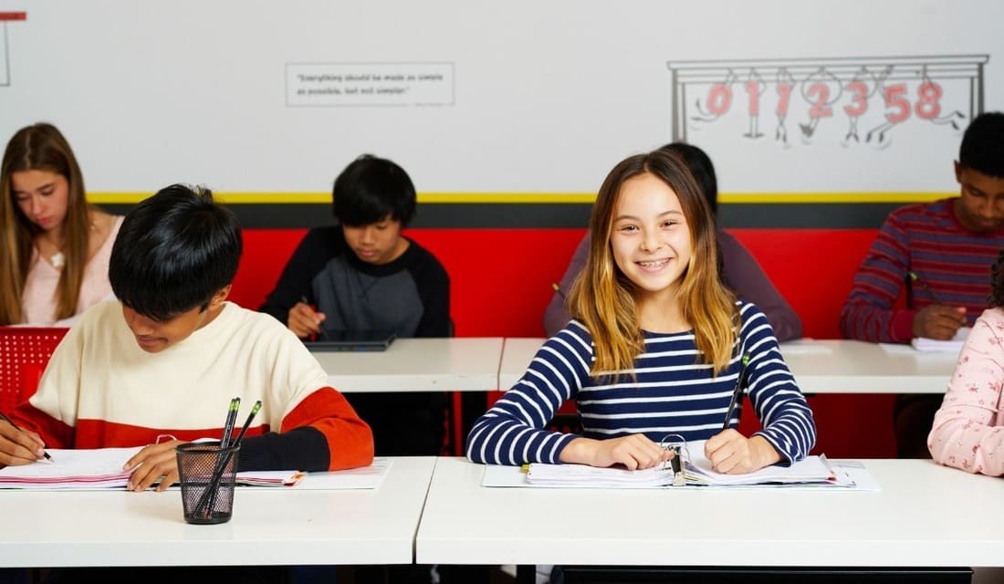 Math students in the classroom working on math problems at Mathnasium of Allen, TX