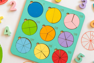 A vibrant puzzle board featuring various colorful shapes arranged in a playful design.